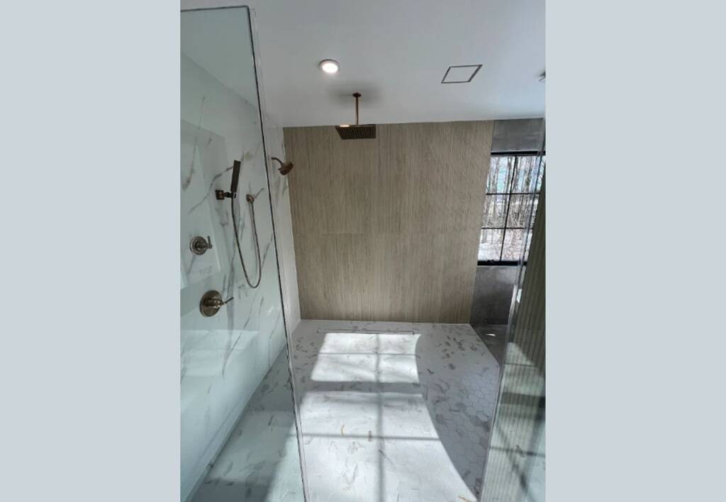 Modern walk-in shower showcasing premium finishes, ideal for showcasing bathroom tile installation cost and design options in NJ.